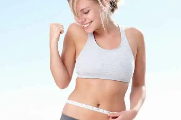 woman happy after fat reduction treatment Salford