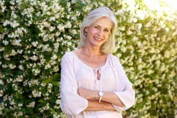Older woman happy with urinary incontinence treatment Salford